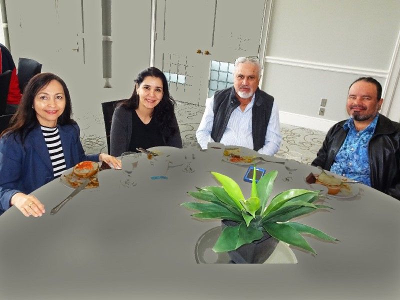 Four guests seated around a table during the awards lunch