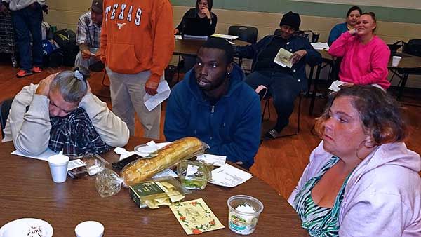Guests seated together for the Thanksgiving community dinner